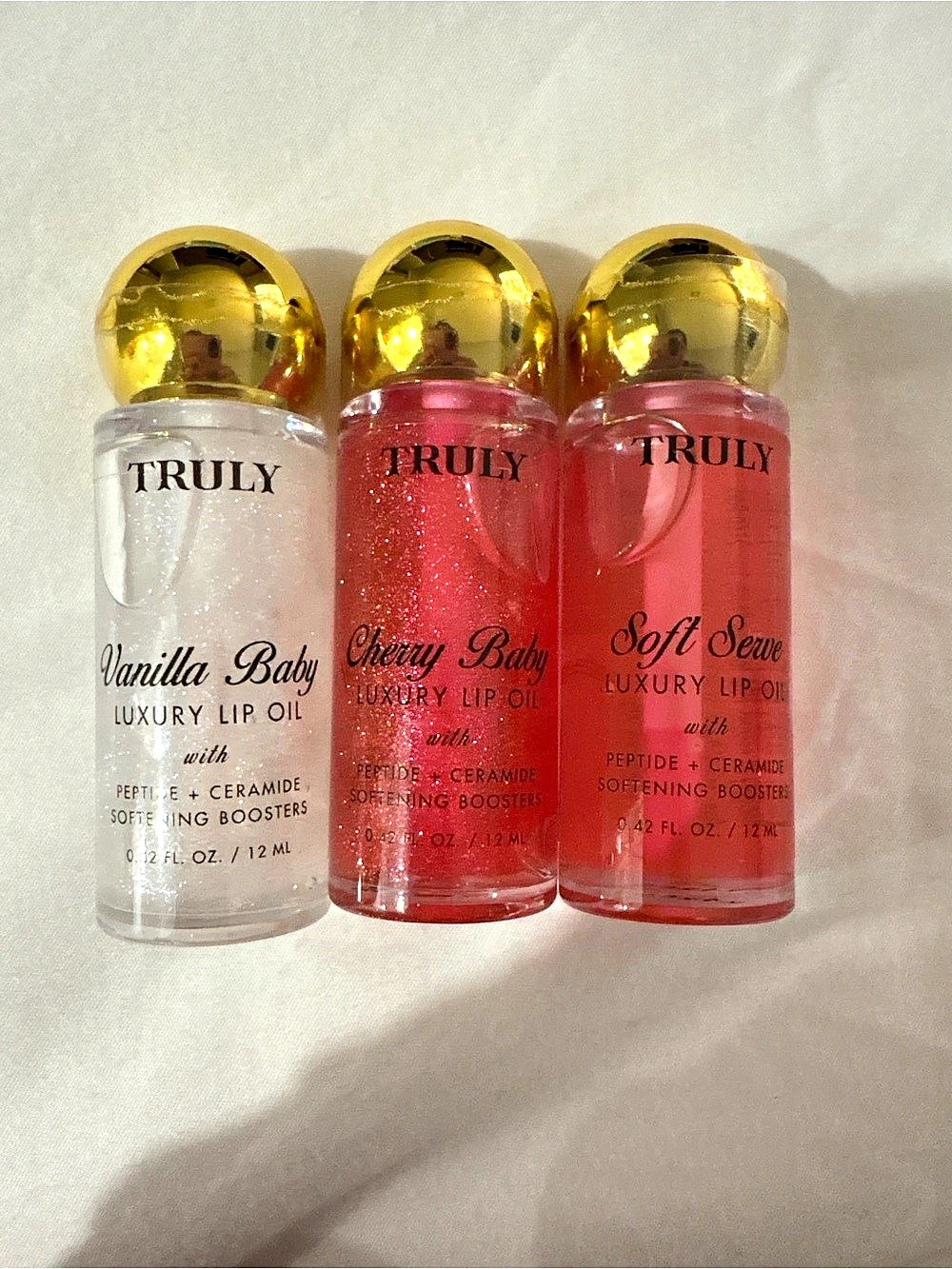 Truly Luxury Lip Oil Trio (Vanilla Baby, Cherry Baby, Soft Serve)
